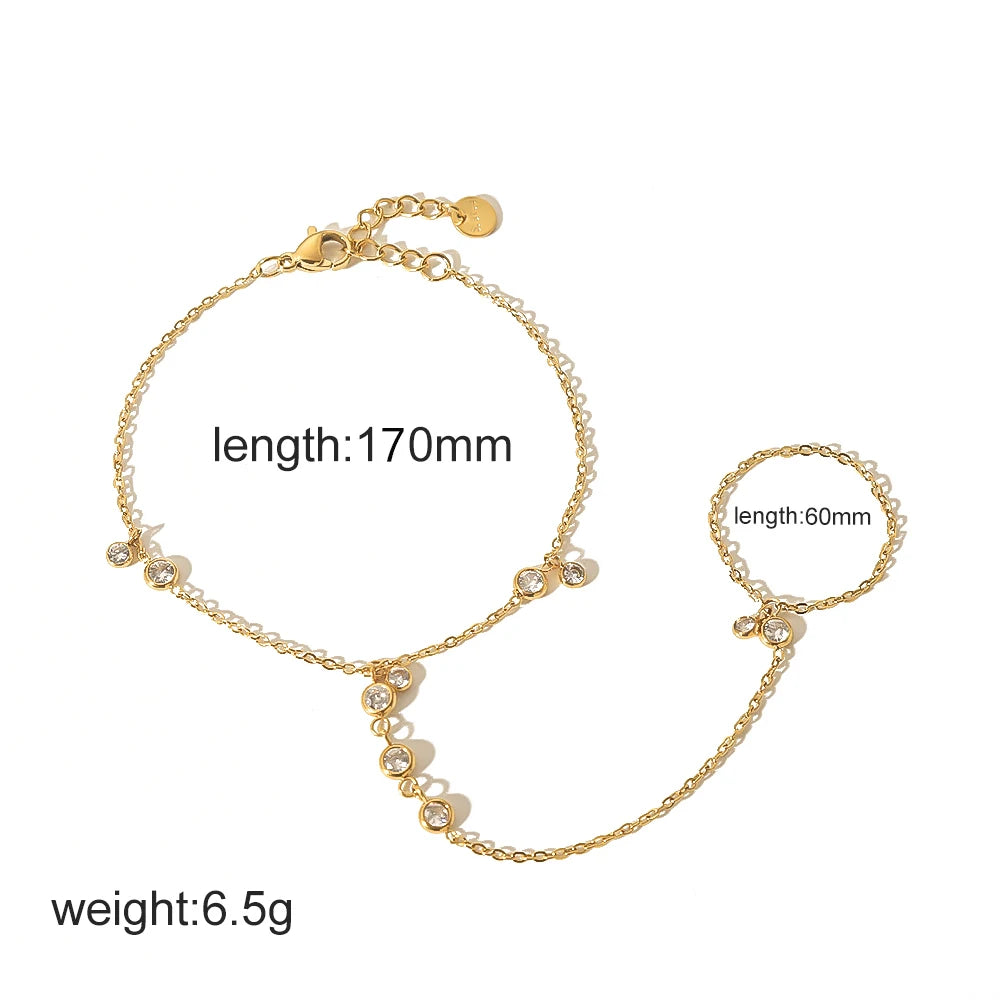 A delicate 18K gold plated stainless steel bracelet with zircon accents, measuring 170mm long.