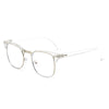 Gafas vintage claras con monturas de metal delgado sobre fondo blanco.