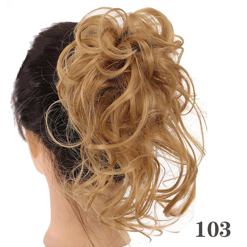A woman's dark hair is styled into a voluminous, messy blonde bun using synthetic hairpiece.