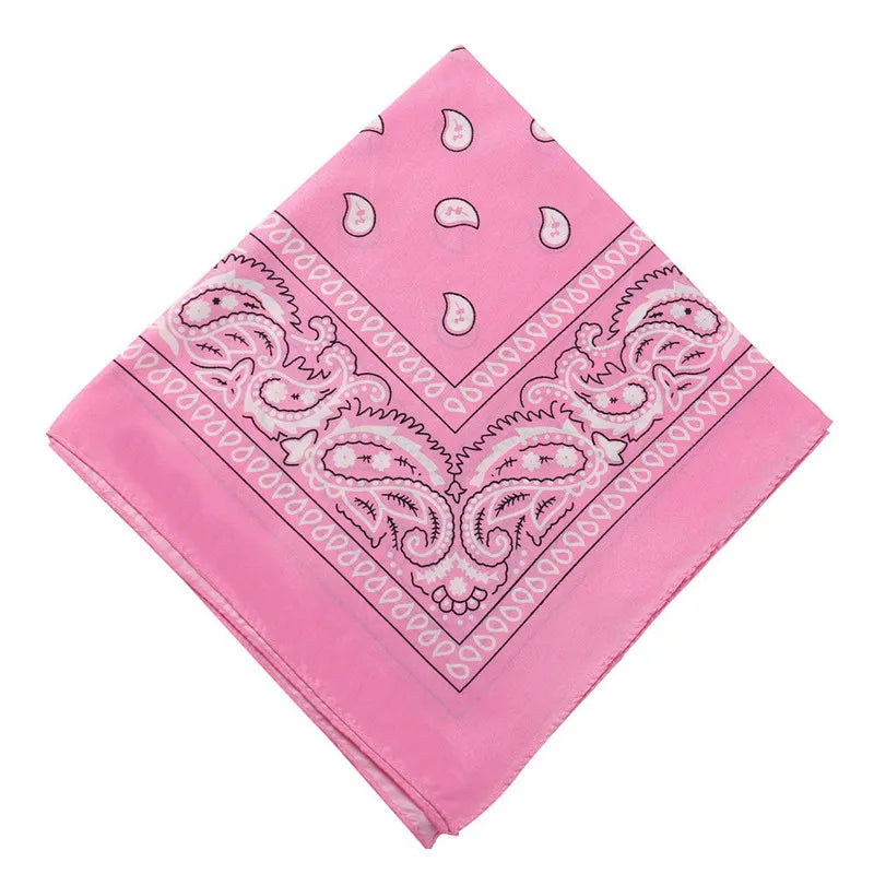 Pink paisley bandana headband featuring intricate embroidery and geometric patterns