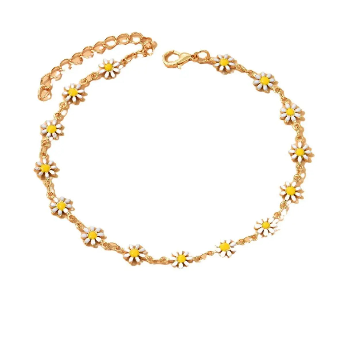 A delicate gold chain anklet featuring small yellow and white enamel daisy charms.