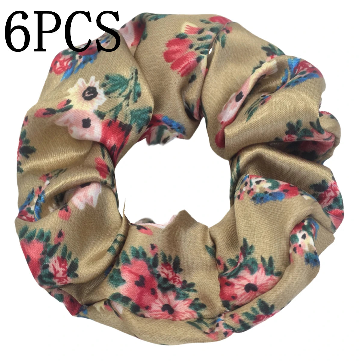 Un juego de seis gomas para el pelo con estampado floral de satén en tonos beige y rosa.