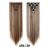 A pair of long, straight brown hair extensions with clip-in attachments shown vertically.