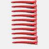 A set of red professional fixed hair pins for styling.