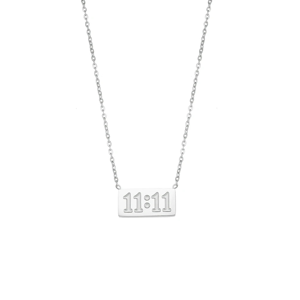 Silver rectangle pendant necklace with the time 11:11 engraved on it
