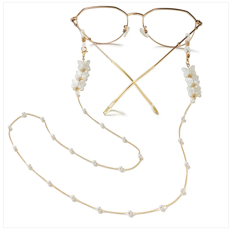 Goldfarbener Stern-Lieb-Schmetterlingskette mit zarten Goldketten und floralen Akzenten für Sonnenbrillen
