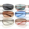 Eine Kollektion ovaler, frameless-Sonnenbrillen in verschiedenen Farben wie schwarz, grün, bronze, blau und klar.