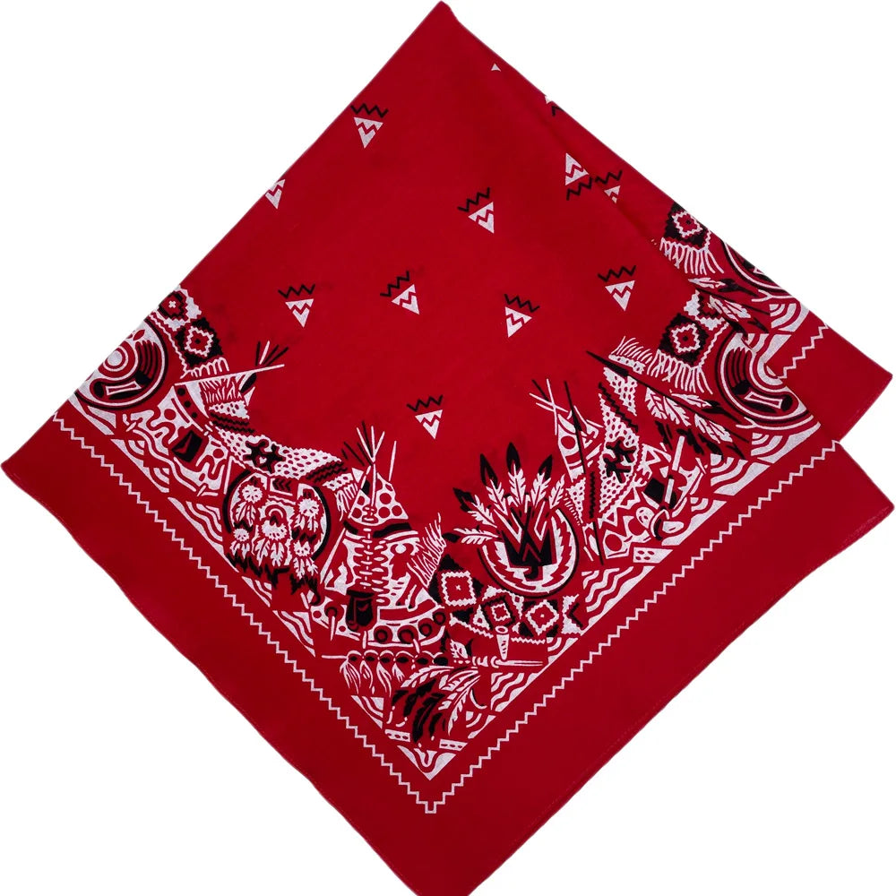 A red bandana scarf featuring white geometric and tribal patterns.
