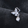 Anneau nasal en acier inoxydable en forme de L argenté avec motif floral et charm en diamant pendillant.