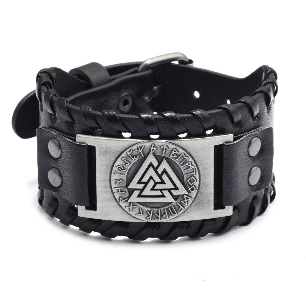 Black leather bracelet with a silver compass design and a buckle.