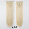 A pair of 24-inch clip-in hair extensions in a light blonde color displayed against a white background.