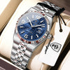 A silver and blue luxury quartz wristwatch with a metal bracelet and leather strap is displayed in a light-colored box.