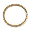 A gold-toned stainless steel Cuban link necklace shown against a white background.