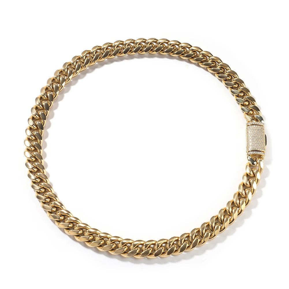 A gold-toned stainless steel Cuban link necklace shown against a white background.