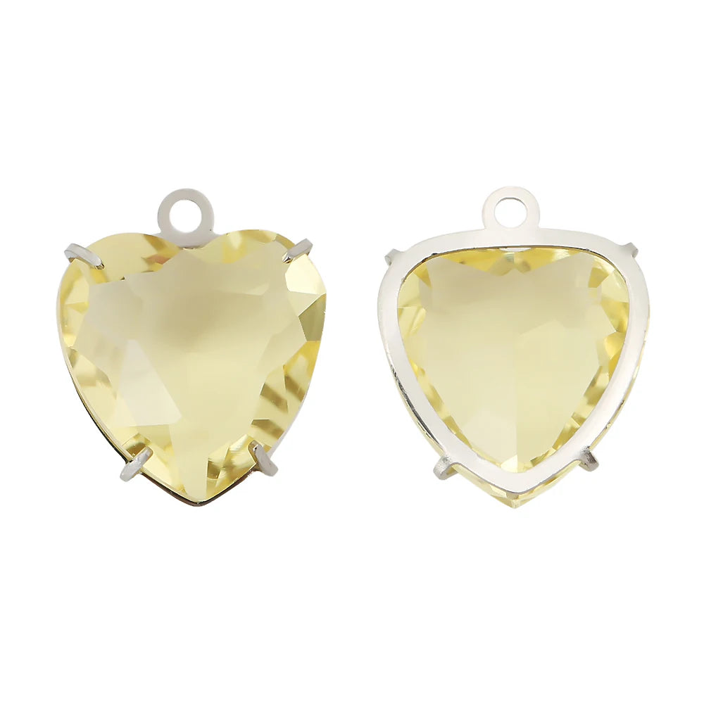 A pair of heart-shaped crystal pendants made of yellow-tinted PVD stainless steel.