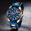 A blue and gold men's luxury quartz sport watch with a chronograph displayed on a dark surface.