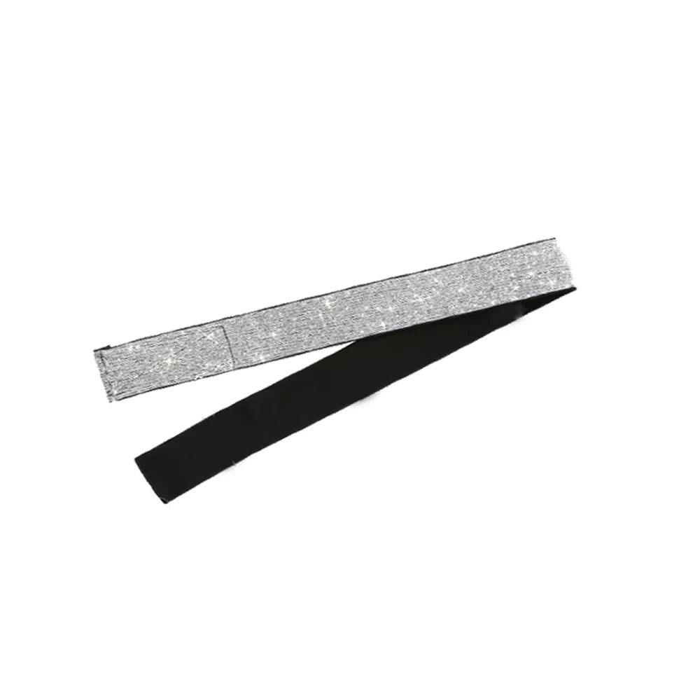 A black adjustable wig band with a silver glitter lining for hairline edging.
