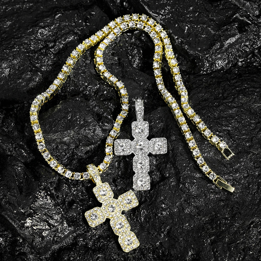 A gold-toned necklace featuring sparkling clear rhinestones in the shape of a cross pendant.
