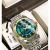 Reloj de pulsera de cuarzo de lujo tono dorado para hombre con esfera azul oscuro y pulsera de plata, mostrado en una caja de
