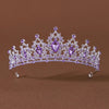 Diadema de cristal lavanda delicada con piedras moradas y intrincados trabajos de metal plateado.