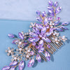 A delicate accessory featuring purple crystal and pearl elements designed as a hair comb or headband.