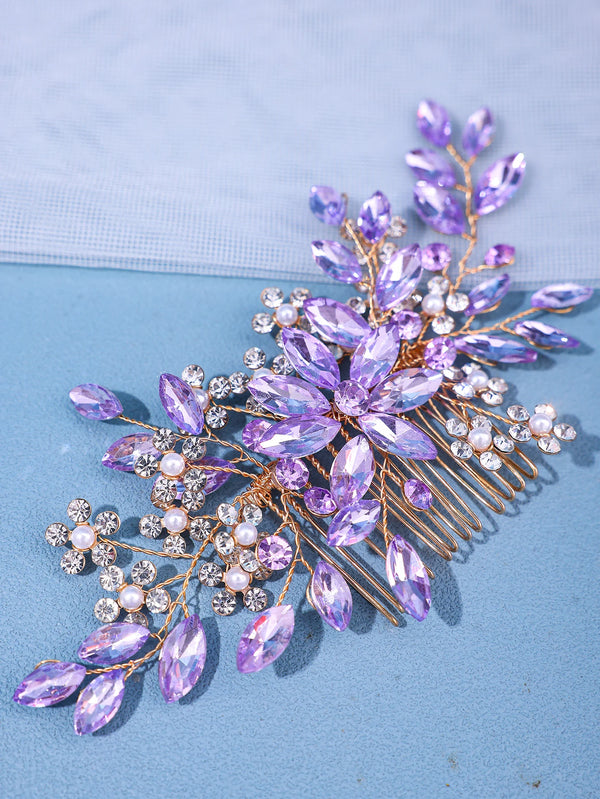 A delicate accessory featuring purple crystal and pearl elements designed as a hair comb or headband.