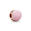 A round rose gold charm pendant with a pink, translucent stone and textured metal setting.