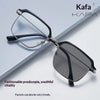 A pair of black photochromic anti-blue light reading glasses resting on a white surface.