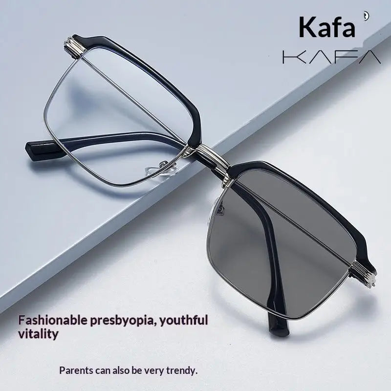 A pair of black photochromic anti-blue light reading glasses resting on a white surface.