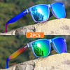 Pair of gradient square frame polarized sunglasses resting on a rocky surface.