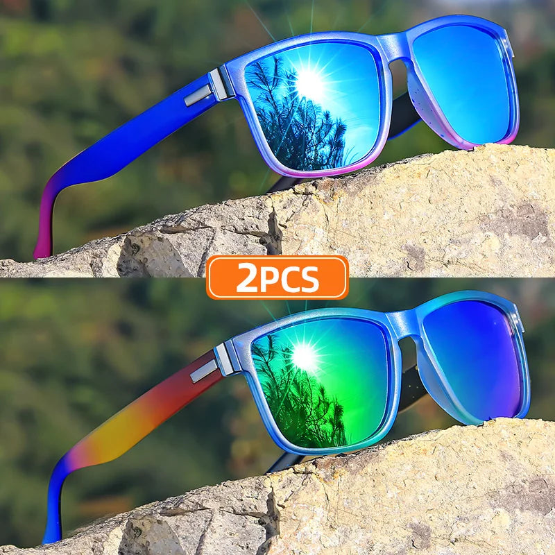 Pair of gradient square frame polarized sunglasses resting on a rocky surface.