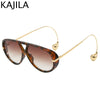 Gafas estilo aviador marrón tintadas con brazos y detalles de metal dorado