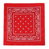 Cuadrado de tela roja con intrincados bordados y patrones blancos.