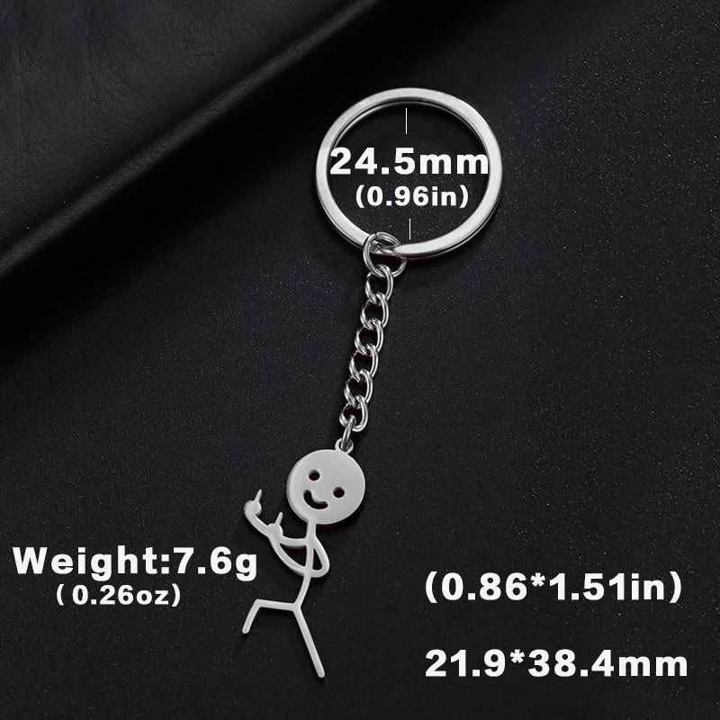 Silver keychain featuring a stickman figure with a middle finger and a measurement circle.