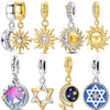 A collection of sterling silver star moon charms and pendants featuring various designs like suns, moons, and geometric shape
