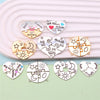 Varias colgantes de collares con forma de corazón para amistad, como Big Sis, Little Sis y Forever.