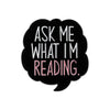 Black speech bubble with white text that reads Ask me what I'm reading.
