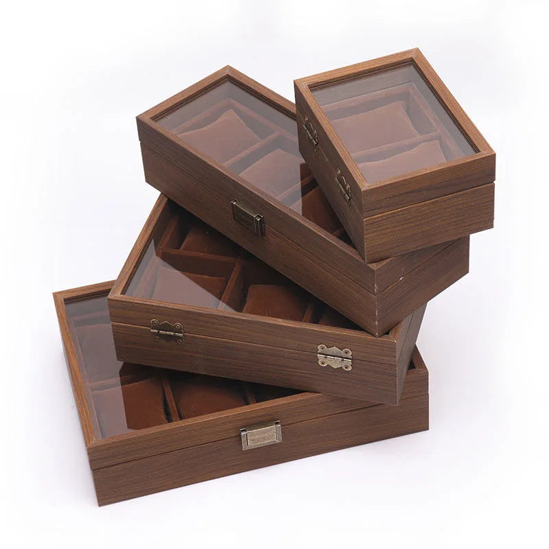 A wooden multi-slot display box for watches and jewelry, featuring clear glass panels.