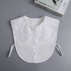 White blouse with a decorative lace false collar and detachable necklines