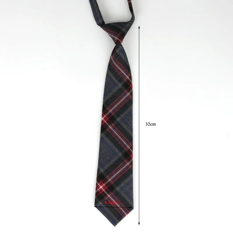 A dark blue and red plaid necktie with a checkered pattern shown vertically.