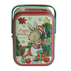 A decorative tinplate candy box featuring a rabbit and holiday decorations on a festive background.