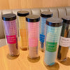 Colección de gomas para el pelo con rayas onduladas de colores morado, amarillo, rosa, azul, verde y negro, exhibidas en cili