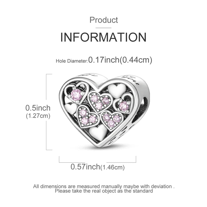 A sterling silver heart-shaped charm with small pink stones, measuring 0.5 inches.