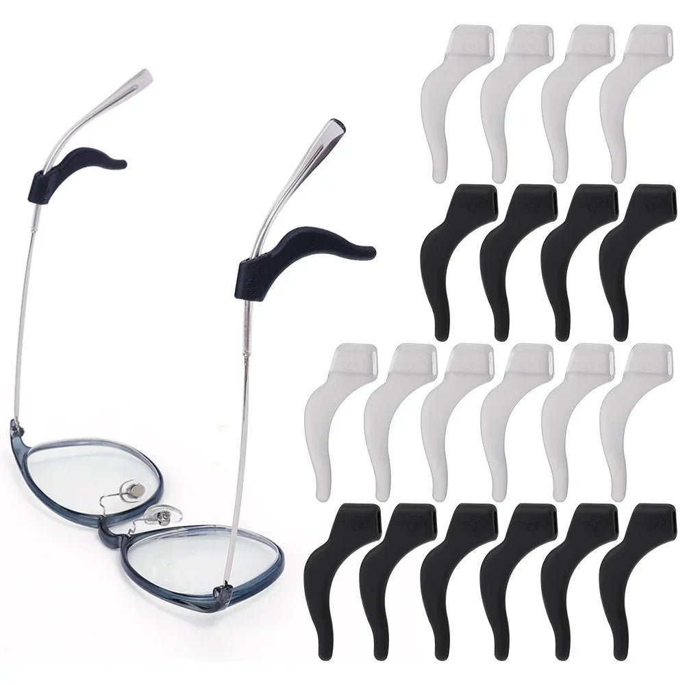 A set of black silicone anti-slip ear hooks for eyewear, shown with a pair of glasses.