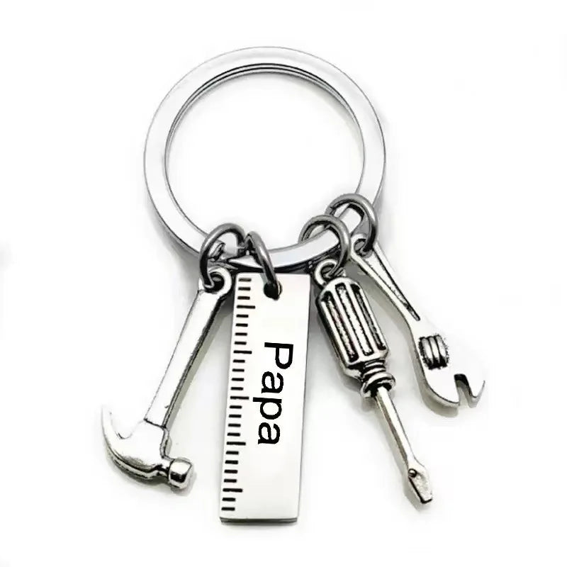 Silver multi-tool keychain set featuring a hammer and pliers.
