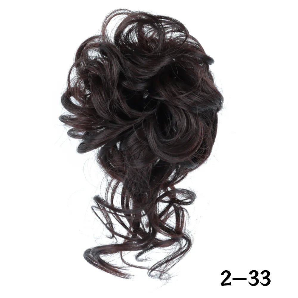 A dark brown messy synthetic hairpiece bun for women