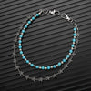 Silver and blue bead double-layer waist chain accessory displayed on a dark background.