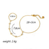Gold plated stainless steel zircon ring bracelet with adjustable chain and pearl accents