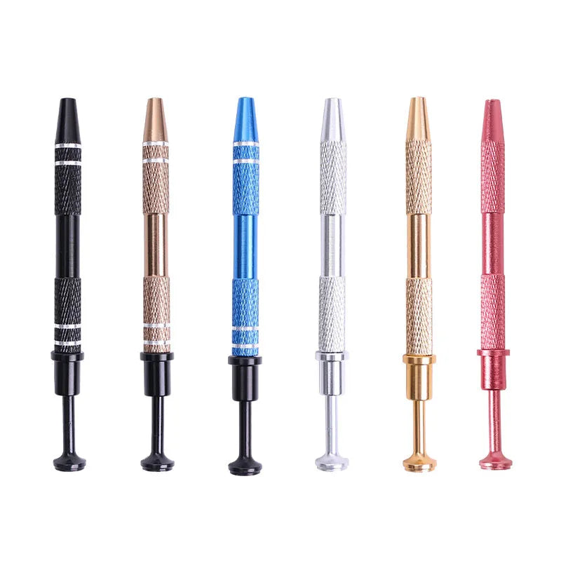 A set of five precision four-claw jewelry pick-up tools in various metallic and pink finishes.