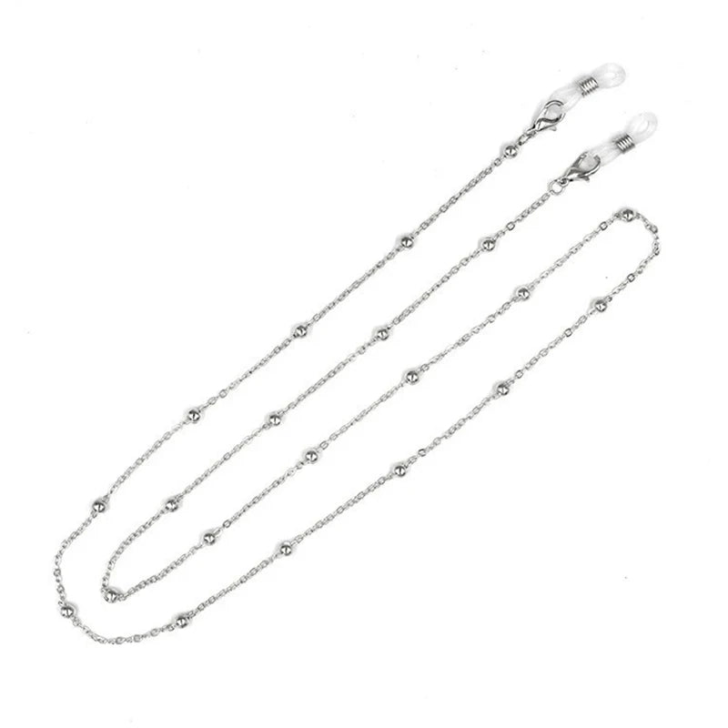 A delicate silver chain made of round metal beads designed for eyewear.